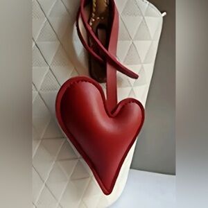 Red bag charm purse accessory
 Quilted Bag with Red Heart Charm